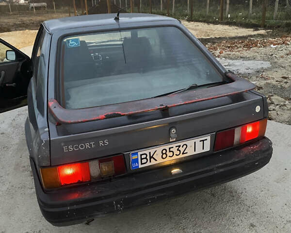 Синий Форд Эскорт, объемом двигателя 1.4 л и пробегом 210 тыс. км за 750 $, фото 2 на Automoto.ua