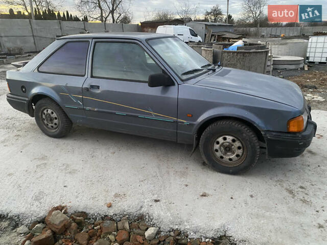 Синий Форд Эскорт, объемом двигателя 1.4 л и пробегом 210 тыс. км за 750 $, фото 5 на Automoto.ua
