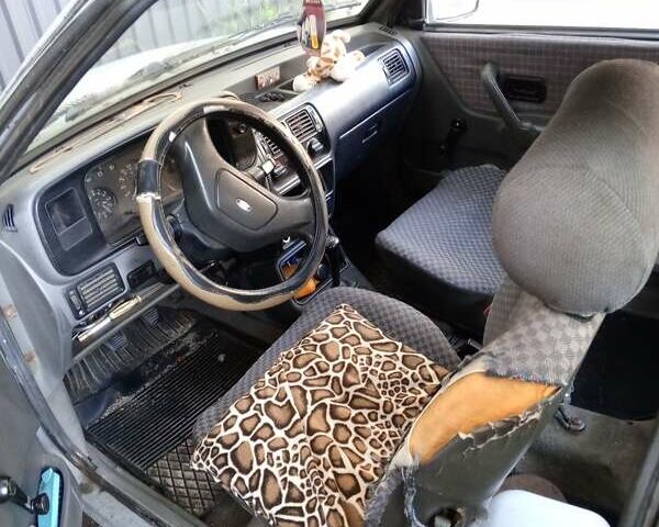 Синий Форд Эскорт, объемом двигателя 1.3 л и пробегом 500 тыс. км за 550 $, фото 5 на Automoto.ua