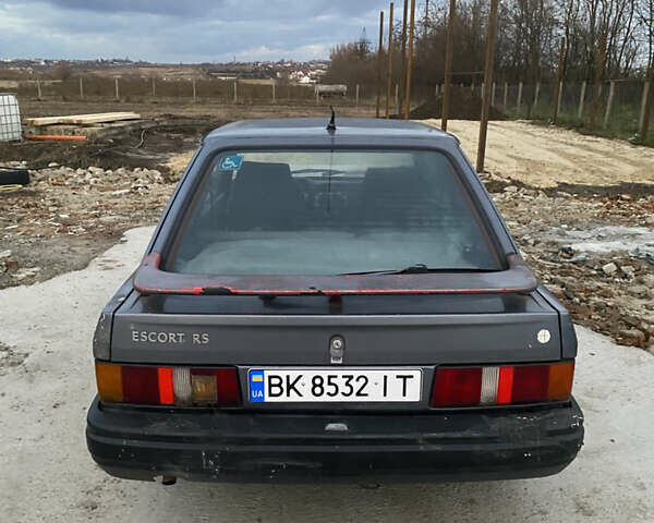 Синий Форд Эскорт, объемом двигателя 1.4 л и пробегом 210 тыс. км за 750 $, фото 6 на Automoto.ua