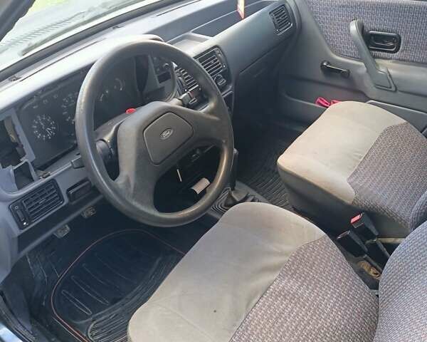 Синий Форд Эскорт, объемом двигателя 1.3 л и пробегом 100 тыс. км за 800 $, фото 5 на Automoto.ua