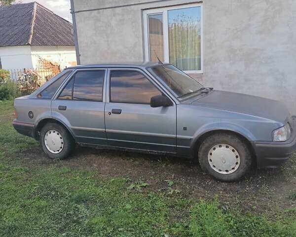 Синий Форд Эскорт, объемом двигателя 1.3 л и пробегом 100 тыс. км за 800 $, фото 2 на Automoto.ua