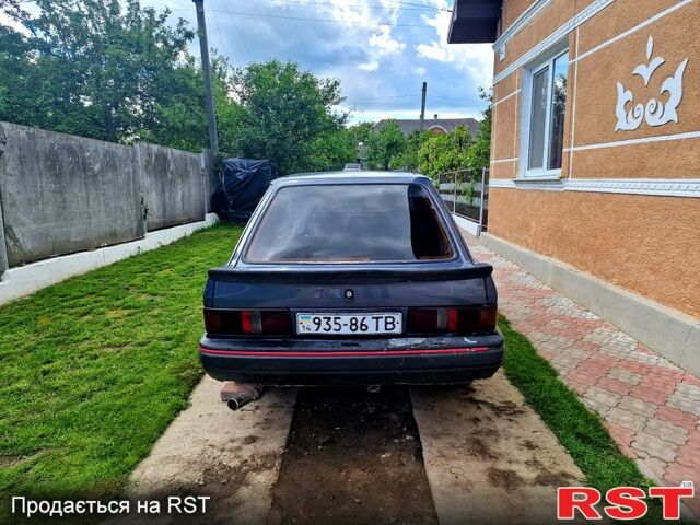 Синий Форд Эскорт, объемом двигателя 1.4 л и пробегом 110 тыс. км за 600 $, фото 3 на Automoto.ua
