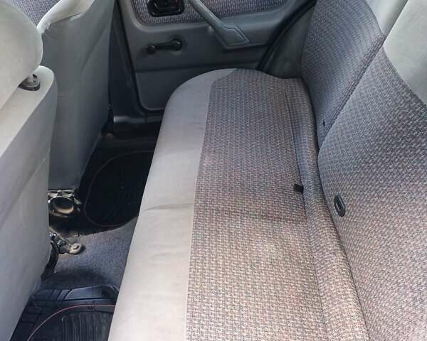 Синий Форд Эскорт, объемом двигателя 1.3 л и пробегом 100 тыс. км за 800 $, фото 4 на Automoto.ua