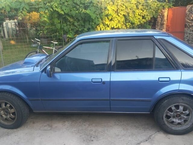 Синій Форд Ескорт, об'ємом двигуна 1.4 л та пробігом 200 тис. км за 1400 $, фото 1 на Automoto.ua