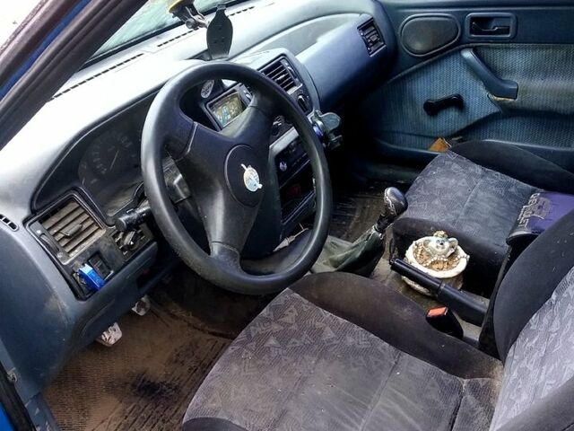 Синій Форд Ескорт, об'ємом двигуна 1.4 л та пробігом 0 тис. км за 1000 $, фото 3 на Automoto.ua