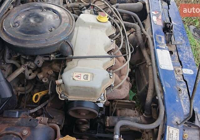 Синий Форд Эскорт, объемом двигателя 1.4 л и пробегом 500 тыс. км за 600 $, фото 6 на Automoto.ua