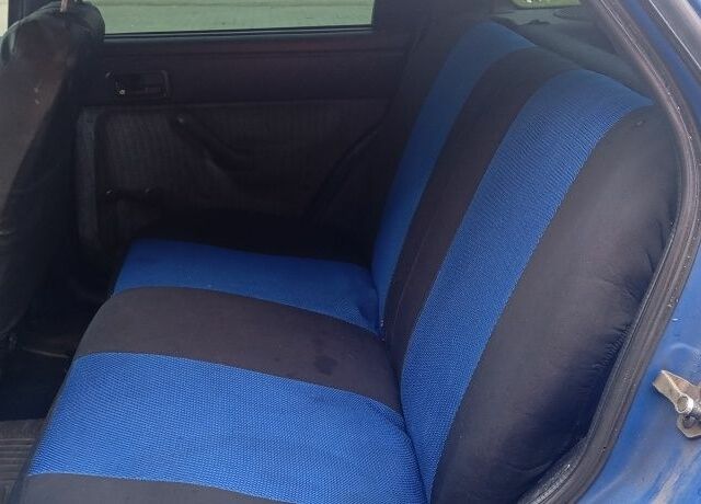 Синий Форд Эскорт, объемом двигателя 1.3 л и пробегом 300 тыс. км за 1300 $, фото 5 на Automoto.ua