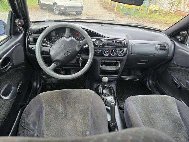 Синій Форд Ескорт, об'ємом двигуна 1.4 л та пробігом 200 тис. км за 850 $, фото 7 на Automoto.ua