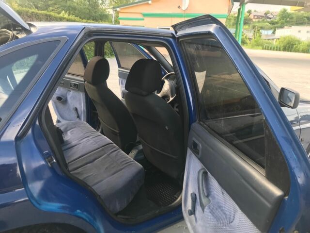 Синий Форд Эскорт, объемом двигателя 1.4 л и пробегом 130 тыс. км за 1000 $, фото 5 на Automoto.ua