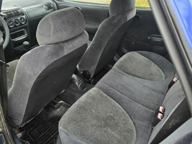 Синій Форд Ескорт, об'ємом двигуна 1.4 л та пробігом 200 тис. км за 850 $, фото 6 на Automoto.ua