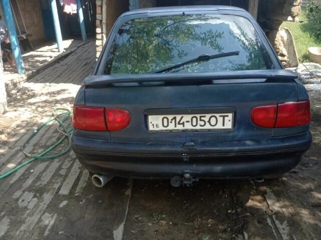 Синий Форд Эскорт, объемом двигателя 2 л и пробегом 100 тыс. км за 429 $, фото 1 на Automoto.ua