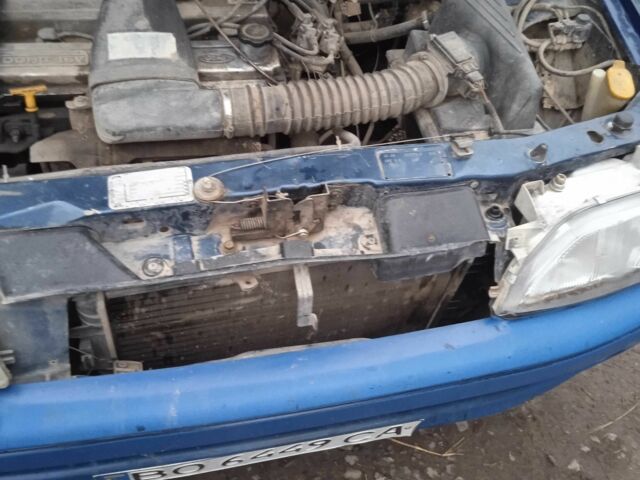 Синий Форд Эскорт, объемом двигателя 1.6 л и пробегом 280 тыс. км за 309 $, фото 2 на Automoto.ua