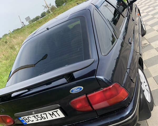 Синий Форд Эскорт, объемом двигателя 1.4 л и пробегом 300 тыс. км за 1850 $, фото 1 на Automoto.ua