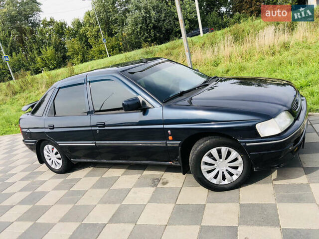 Синий Форд Эскорт, объемом двигателя 1.4 л и пробегом 300 тыс. км за 1850 $, фото 2 на Automoto.ua