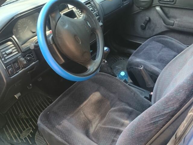 Синий Форд Эскорт, объемом двигателя 1.4 л и пробегом 76 тыс. км за 3000 $, фото 3 на Automoto.ua