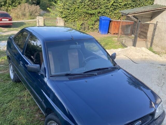 Синий Форд Эскорт, объемом двигателя 1.4 л и пробегом 250 тыс. км за 1300 $, фото 3 на Automoto.ua
