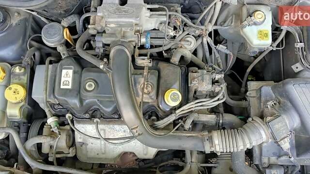 Синий Форд Эскорт, объемом двигателя 1.4 л и пробегом 999 тыс. км за 1492 $, фото 4 на Automoto.ua