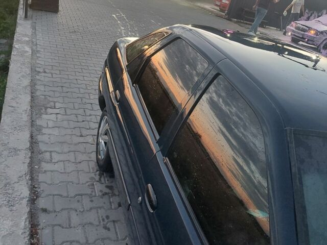 Синій Форд Ескорт, об'ємом двигуна 1 л та пробігом 100 тис. км за 672 $, фото 4 на Automoto.ua