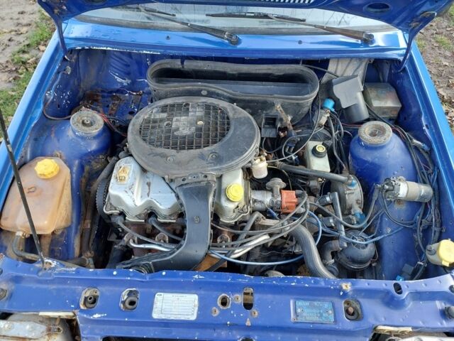 Синий Форд Эскорт, объемом двигателя 1.4 л и пробегом 256 тыс. км за 550 $, фото 4 на Automoto.ua