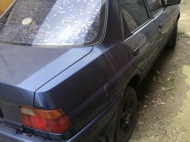 Синий Форд Эскорт, объемом двигателя 1.4 л и пробегом 150 тыс. км за 1250 $, фото 3 на Automoto.ua