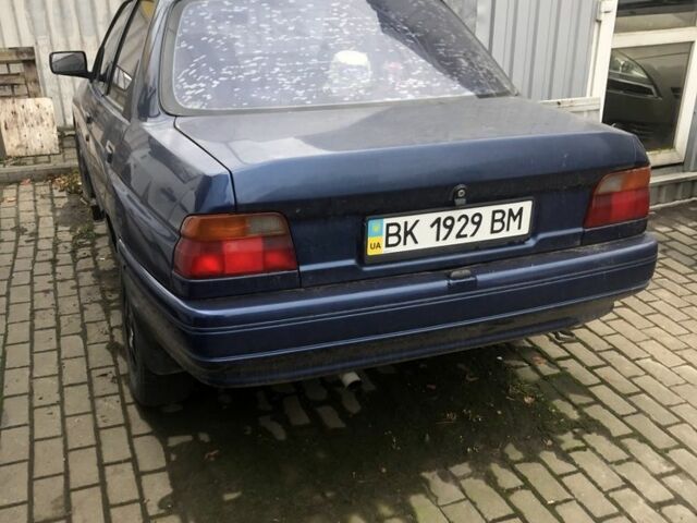 Синий Форд Эскорт, объемом двигателя 1.4 л и пробегом 150 тыс. км за 1250 $, фото 1 на Automoto.ua