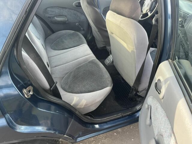 Синий Форд Эскорт, объемом двигателя 1.6 л и пробегом 115 тыс. км за 1300 $, фото 5 на Automoto.ua