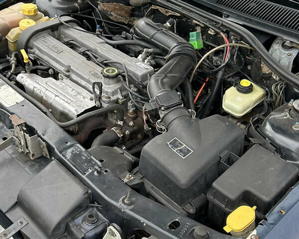 Синий Форд Эскорт, объемом двигателя 1.6 л и пробегом 62 тыс. км за 1500 $, фото 12 на Automoto.ua