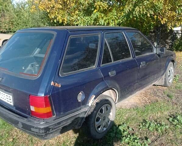 Синий Форд Эскорт, объемом двигателя 1.3 л и пробегом 200 тыс. км за 650 $, фото 1 на Automoto.ua