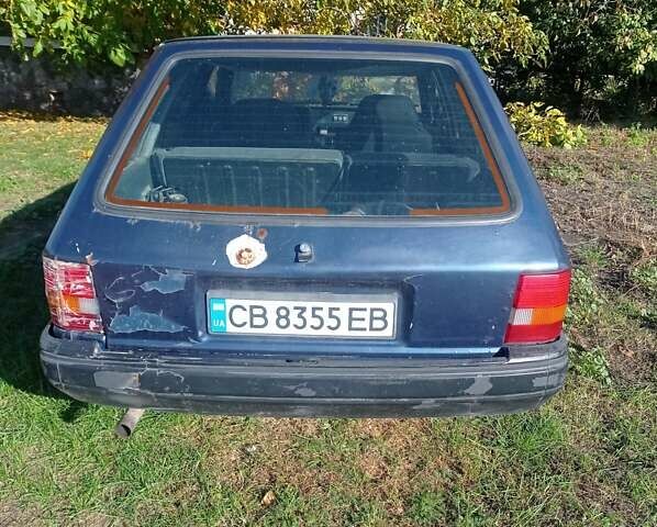 Синий Форд Эскорт, объемом двигателя 1.3 л и пробегом 200 тыс. км за 650 $, фото 3 на Automoto.ua