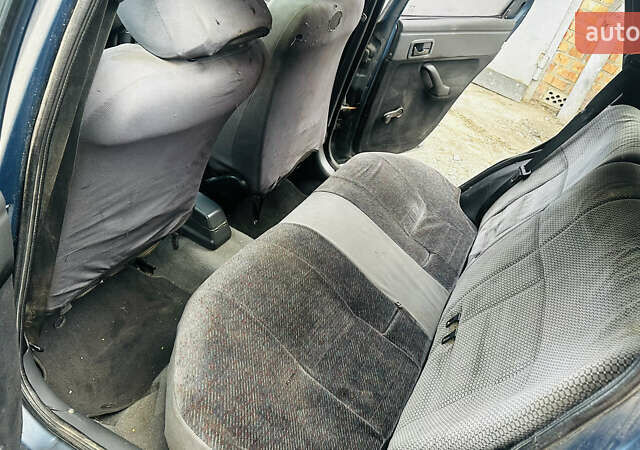 Форд Эскорт 1991 в Виннице на Automoto.ua Синий Форд Эскорт, объемом двигателя 1.6 л и пробегом 220 тыс. км за 1099 $, фото 8 на Automoto.ua