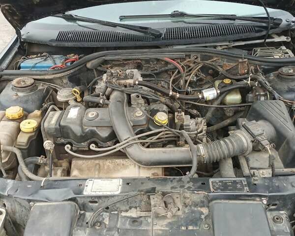 Синий Форд Эскорт, объемом двигателя 1.4 л и пробегом 200 тыс. км за 2000 $, фото 1 на Automoto.ua