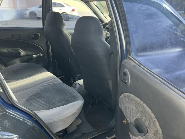 Синий Форд Эскорт, объемом двигателя 1.4 л и пробегом 200 тыс. км за 600 $, фото 11 на Automoto.ua