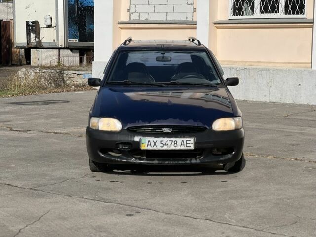 Синий Форд Эскорт, объемом двигателя 1.4 л и пробегом 200 тыс. км за 600 $, фото 4 на Automoto.ua