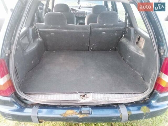 Синий Форд Эскорт, объемом двигателя 1.6 л и пробегом 150 тыс. км за 600 $, фото 1 на Automoto.ua