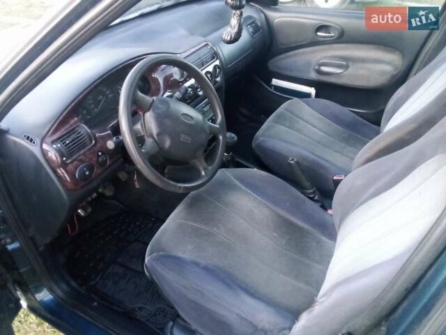 Синий Форд Эскорт, объемом двигателя 1.6 л и пробегом 150 тыс. км за 600 $, фото 4 на Automoto.ua