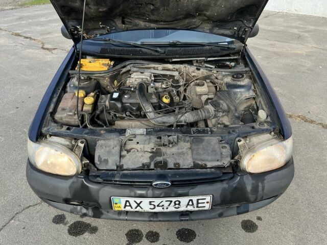 Синий Форд Эскорт, объемом двигателя 1.4 л и пробегом 200 тыс. км за 600 $, фото 12 на Automoto.ua