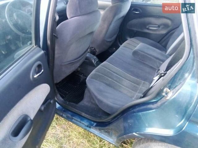 Синий Форд Эскорт, объемом двигателя 1.6 л и пробегом 150 тыс. км за 600 $, фото 2 на Automoto.ua