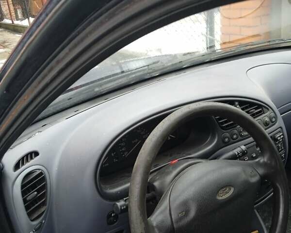 Синій Форд Ескорт, об'ємом двигуна 1.4 л та пробігом 181 тис. км за 1500 $, фото 3 на Automoto.ua