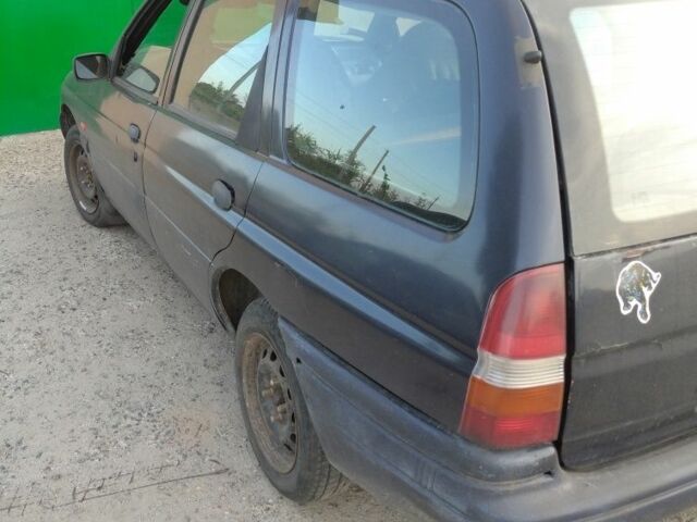 Синий Форд Эскорт, объемом двигателя 1.4 л и пробегом 300 тыс. км за 1300 $, фото 3 на Automoto.ua