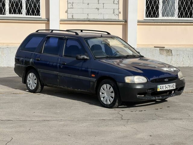 Синий Форд Эскорт, объемом двигателя 1.4 л и пробегом 200 тыс. км за 600 $, фото 1 на Automoto.ua