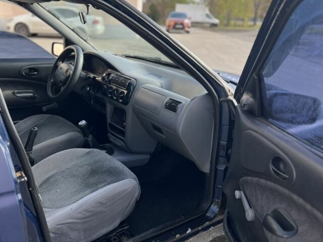 Синий Форд Эскорт, объемом двигателя 1.4 л и пробегом 200 тыс. км за 600 $, фото 10 на Automoto.ua