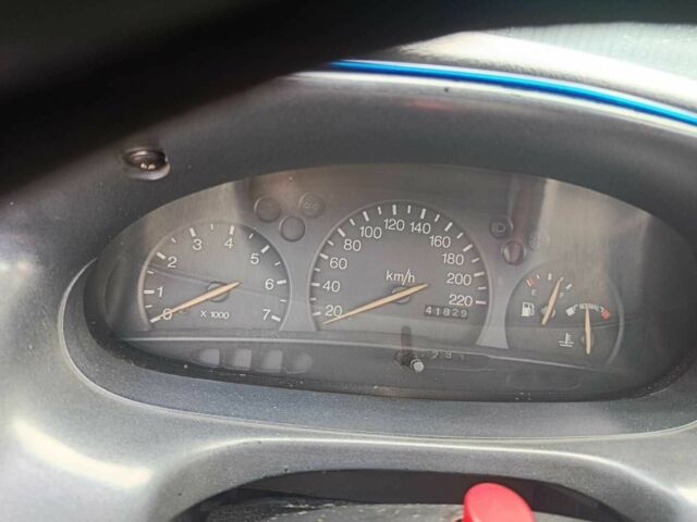 Синий Форд Эскорт, объемом двигателя 1.4 л и пробегом 41 тыс. км за 1600 $, фото 2 на Automoto.ua