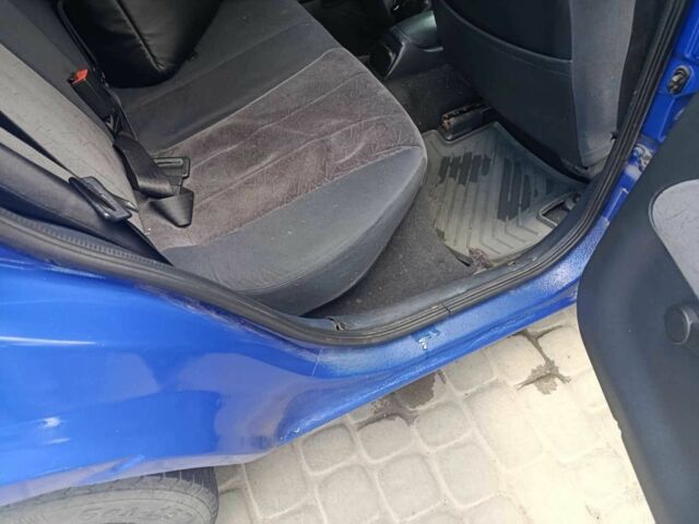 Синий Форд Эскорт, объемом двигателя 1.4 л и пробегом 41 тыс. км за 1600 $, фото 9 на Automoto.ua