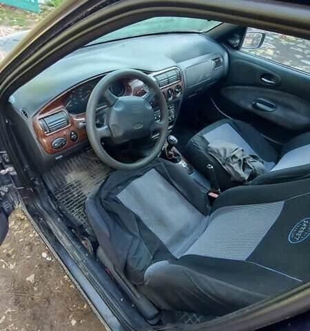 Синій Форд Ескорт, об'ємом двигуна 1.6 л та пробігом 89 тис. км за 2000 $, фото 4 на Automoto.ua
