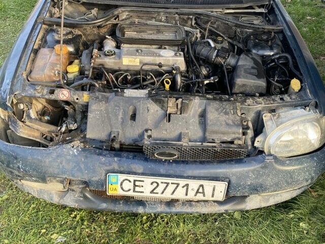 Синий Форд Эскорт, объемом двигателя 1.8 л и пробегом 58 тыс. км за 1000 $, фото 5 на Automoto.ua