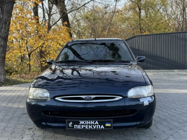 Синий Форд Эскорт, объемом двигателя 1.8 л и пробегом 300 тыс. км за 1000 $, фото 2 на Automoto.ua