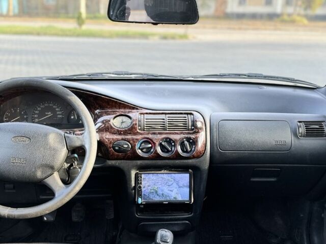 Синий Форд Эскорт, объемом двигателя 1.8 л и пробегом 300 тыс. км за 1000 $, фото 5 на Automoto.ua