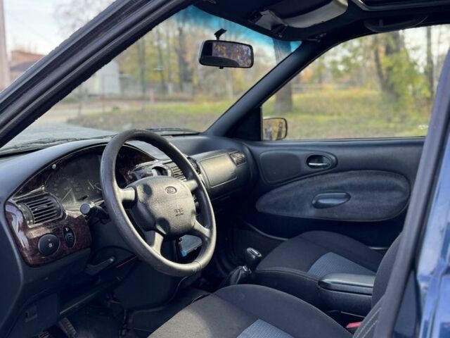 Синий Форд Эскорт, объемом двигателя 1.8 л и пробегом 300 тыс. км за 1000 $, фото 6 на Automoto.ua