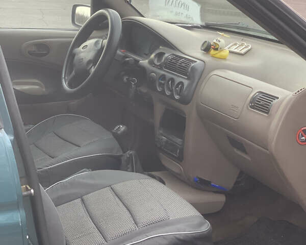 Зеленый Форд Эскорт, объемом двигателя 1.8 л и пробегом 216 тыс. км за 1700 $, фото 4 на Automoto.ua